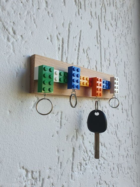 Bring back your childhood memories with this stylish lego key holder and let creativity play around !! Lego Keychain Holder, Lego Key Holder, Lego Interior Design, Lego Key Holders, Deco Lego, Lego Room Decor, Hot Wheels Room, Key Holder Diy, Diy Rangement