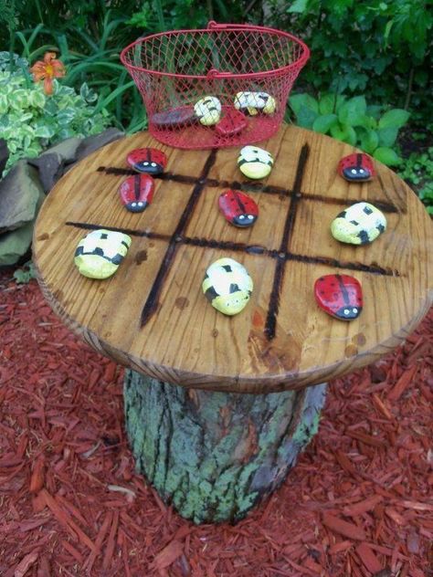 Inspired by a similar idea in pinterest, I found a round wooden table top at the local home improvement store-perfect! My son-in-law burned a tic-tac-toe grid o… Taman Diy, Whimsical Garden Art, Jardim Diy, Diy Outdoor Decor, Garden Wallpaper, Natural Playground, Unique Garden, Outdoor Diy Projects, 15 Diy