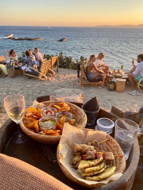 Sunset view at Scorpios in Mykonos Scorpios Mykonos Aesthetic, Summer In Mykonos, Mykonos Greece Food, Scorpios Mykonos Outfit, Mykonos Photo Ideas, Mykonos Scorpios, Mykonos Greece Aesthetic, Mykonos Aesthetic, Mykonos Party