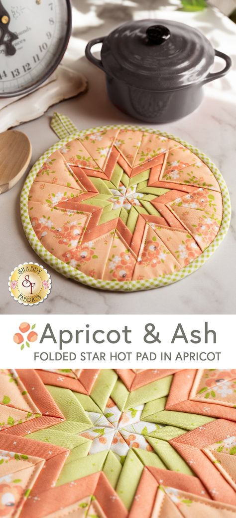 Add an exciting twist to your Christmas dinner table with the Folded Star Hot Pad Kit made with Apricot & Ash collection by Moda Fabrics. These adorable hot pads are easily assembled using the Interfacing Template provided in each kit. Follow along with Jen in the video tutorial below as she shows you how quick and easy this project comes together, from fabric layout, to sewing to bias binding! Finished hot pad measures approximately 8" x 8". Quilted Potholder Pattern, Folded Star, Colorful Quilt, Laser Cut Kit, Quilted Potholders, Christmas Dinner Table, Potholder Patterns, Hot Plates, Colorful Quilts