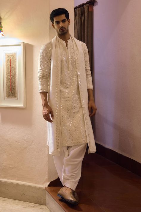 Ivory kurta with thread embroidery all over. Paired with an ivory salwar and embroidered border dupatta. - Aza Fashions Men Ethnic Outfit, Mens Embroidery Kurta, Wedding Kurta For Men Style, Best Kurta Designs For Men, Mirror Kurta Men, Shiv Outfits, Koti Kurta For Men Wedding, Haldi Outfits For Men, Kurta Designs Men