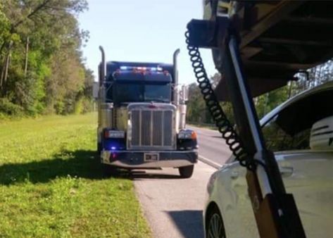 Online trucking communities have recently been stirred up by images of Florida troopers stealthily patrolling in their own big rig, but it turns out that they -- and other law enforcement agencies -- have been using semi trucks to hide in plain sight for years. A pair of posts featuring a Florida Highway Patrol big rig have been shared in many trucking groups in the past week. One of posts appeared on Facebook with the caption 'This is what trucking has come to...Be careful drivers this is in Fl Florida Highway Patrol, Custom Peterbilt, Custom Big Rig, Truck Detailing, Tractor Trailer Truck, Highway Patrol, Tractor Trailers, State Police, Big Rig