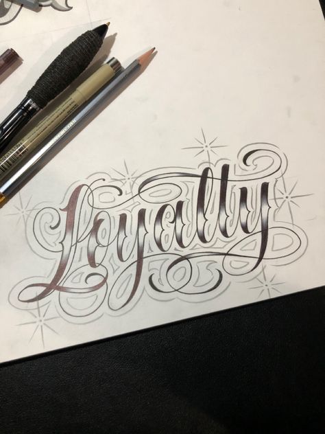 Loyalty Script Tattoo, Script Lettering Tattoo Calligraphy, Chicano Art Lettering, Family Lettering Tattoo Design, Chicano Art Style Letters, Chicano Tattoo Font Alphabet, Chicano Lettering Drawing, Chicana Letters, Cursive Chicano Lettering