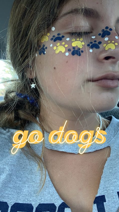 High School Football Makeup, Face Dots For Football Games, Highschool Football Game Face Paint, Glitter On Face Football Game, Spirit Makeup Football, Paw Print Makeup, School Face Paint Ideas, Hoco Face Paints, Football Face Painting Ideas