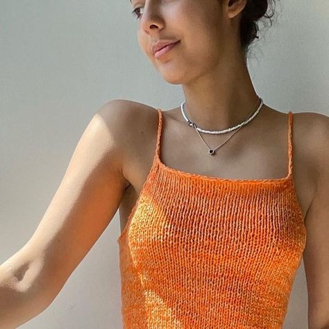 Roshni Brook on Instagram: "Orange knitted cami with tie back :)) Love this colour!! Adjustable and super comfy Available to buy on my depop now ✨ #handmadeclothes #handknitsummertop #knittop #summerknitting" Orange Top Crochet, Orange Crochet Top, Crochet Orange, Orange Top, Summer Knitting, Summer Top, Handmade Clothes, Tie Backs, Tie Back