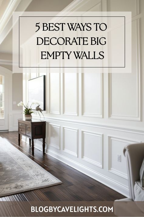 Looking to add personality to your space? Discover the top 5 large wall decor ideas that'll leave a lasting impression. From statement pieces to elegant wall designs, your walls will thank you. Click to elevate your home! Big Wall Living Room Ideas, Tall Entryway Wall Decor Ideas, Hanging Pictures On Paneled Walls, Styling A Long Wall, Large Plain Wall Ideas Living Room, Wall Molding Living Room High Ceiling, Bedroom Big Wall Decor Ideas, Big Picture Wall Ideas Living Room, Wall Art Big Walls