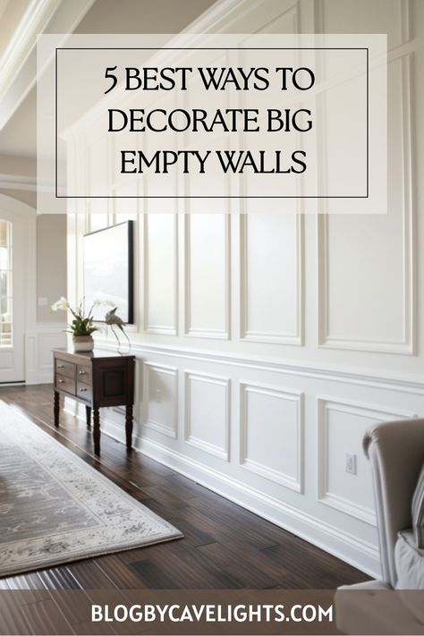 Looking to add personality to your space? Discover the top 5 large wall decor ideas that'll leave a lasting impression. From statement pieces to elegant wall designs, your walls will thank you. Click to elevate your home! Idea For Large Wall In Living Room, Large Entry Living Room Ideas, Tall Entryway Wall Decor Ideas, Tall Wall Trim Ideas, Large Plain Wall Ideas Living Room, Long Bare Wall Ideas Living Room, Large Great Room Wall Decor Ideas, Kitchen Wall Trim, Large Foyer Art