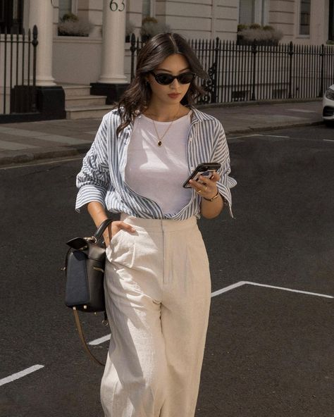 @michellelin.lin wears a blue-stripe shirt with cream trousers Wardrobe Fails, Outfits With Striped Shirts, Zara Midi Skirt, Satin Slip Skirt, Stripped Shirt, Blue Striped Shirt, Slip Skirts, Striped Long Sleeve Tee, Printed Midi Skirt