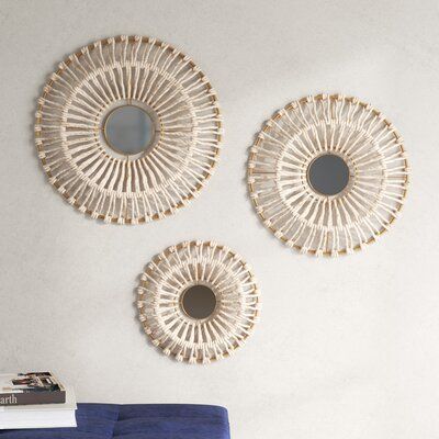 This 3-piece set of wall decor combines industrial-inspired metal with natural corn husks to create a look that's easily at-home in all sorts of different decor styles. Each piece is made from a round iron frame with an airy, open silhouette. The mirror center provides contrast against the airy look of the corn husks for a cool-casual vibe we love. Plus? It offers a place to check your reflection as you walk out the door or pass by this set in your hallway. With three different sizes, this set l Wayfair Wall Art, Modern Boho Wall Decor, Corn Husks, Starburst Wall Decor, Dimensional Wall Art, Diy Backsplash, Dimensional Wall, Natural Boho, Apartment Aesthetic