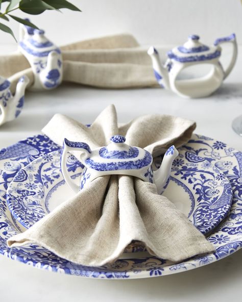 Teapotshaped napkin rings featuring a blue motif     Crafted of porcelain     Approx. 1.5"L x 3.9"W x 2.6"T    Item Weight (Lbs.): 0.7    Set of four     Imported Spode Blue Italian, Italian Dinnerware, Teapot Cake, Italian Pattern, Italian Gifts, The Missing Piece, Curiosity Shop, Italian Countryside, Christmas Tree Shop