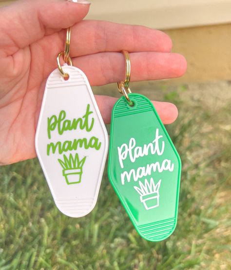 "Unlock your inner plant mom style with this retro motel keychain featuring a charming plant-themed vinyl design. Available in two delightful color options, green with white vinyl or white with green vinyl, this keychain is the perfect accessory for plant lovers on the go. Channeling a nostalgic retro vibe, this keychain adds a touch of whimsy and personality to your keys or bag. The vibrant green with white vinyl option brings a fresh and lively feel, while the white with green vinyl option off Retro Motel Keychain Ideas, Motel Keychain Ideas, Succulent Keychain, Cricut Keychain Ideas, Keychain Sayings, Retro Motel Keychain, Retro Keychain, Diy Keychains, Retro Motel