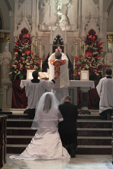 "Introibo ad altare Dei, ad Deum qui laetificat juventutem meum...": the married couple consecrated, and as an outward sign of God's love for us in the Eucharist. And no, a Catholic wedding Mass is not God signing off on everything that we do, or "the official rubber stamp from the Big Guy Upstairs." We promise to love each other in a specific way (as God loved us) before the altar of God, and it's what we are going to be held accountable to. Catholic Wedding Traditions, Catholic Marriage, Church Catholic, Anne Barge, Wedding Church, Catholic Wedding, Eucharist, Church Wedding, Wedding Advice