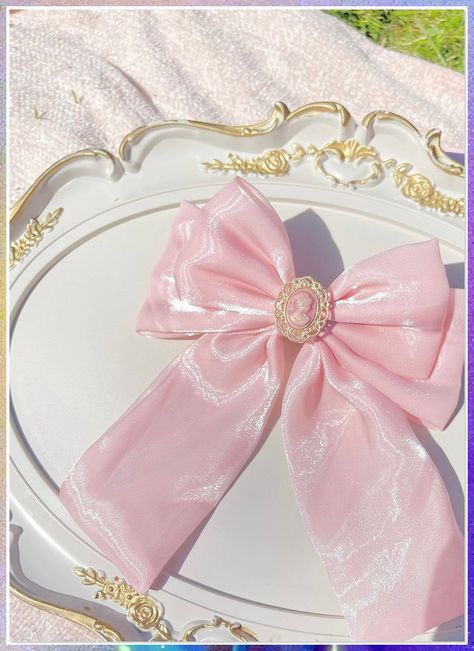 Discover an exquisite collection of beautiful and stylish hair bows for every occasion. Elevate your hairstyle with these trendy hair accessories that are perfect for adding a touch of glamour to your look. Whether you're attending a special event or simply want to elevate your everyday style, these hair bows are the perfect choice. Shop now and add a touch of elegance to your hairdo! Princess Hairstyles, Couture, Pink Hair Accessories, Princess Hair Bows, Organza Bow, Gelang Manik-manik, Ribbon Crafts Diy, Handmade Fairy, Pink Hair Bows