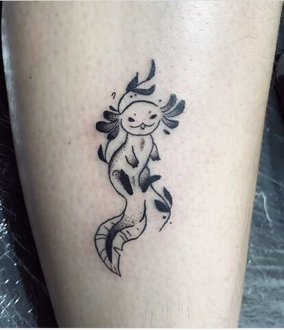 51 Axolotl Tattoos- Celebrating the Enigmatic Mexican Salamander - Psycho Tats Small Salamander Tattoo, Axotl Tattoo, Axolotl Tattoo Ideas, Axolotl Tattoo Design, Weird Animal Tattoos, Fairy Frog Tattoo, Axolotl Tattoo Small, Atla Tattoo Ideas, Roly Poly Tattoo