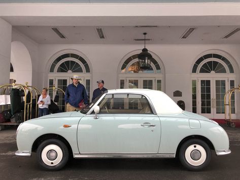 1991 Nissan Figaro outside of a hotel loby City Car, 1991 Nissan Figaro, Nissan Figaro, Tokyo Motor Show, Beach Cars, Cargo Van, Performance Cars, Vintage Italian, The Happy