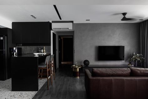 10 Dark Homes That Nail the Luxe and Cosy Look Effortlessly | Qanvast Dark Style Living Room, Aesthetic Dark Apartment, Dark Modern Contemporary Living Room, Dark Living Room Small, Dark Contemporary House, Dark Contemporary Interior, Living Room Dark Aesthetic, Modern Dark Apartment, Dark Modern Apartment