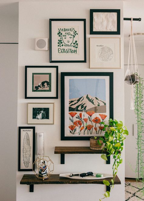 Make a statement with this easy to create gallery wall in your home! An affordable and easy update to any space... #gallerywall #statementwall #artprints #frames #gallery #entryway #nyc #apartmentstyle #bloggerhome #homedecor #interiordecorating #decor #homestyle #midcentury #modernhome #nycapartment #bloggerhome #apartment #interiorstyle #apartmenttherapy #houseplants Gallery Wall Ideas Shelves, Casual Gallery Wall, Apartment Frame Decor, Small Apartment Gallery Wall, Apartment Decorating Pictures, Bookshelf And Gallery Wall, Midcentury Modern Photo Wall, Gallery Wall With Polaroids, Photo Display Ideas Home