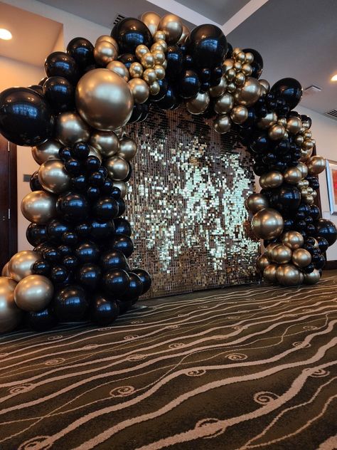 Gold backdrop, balloon arch, gold and black balloon arch, gold shimmer backdrop, party rental, and decoration Black And Gold Balloons Background, Masquerade Party Balloon Decorations, Black Golden Ballons Decoration, Masquerade Ball Photo Backdrop, Black White Gold Prom Theme, Masquerade Ball Balloon Arch, Gala Theme Party Ideas, Black Balloon Arch Backdrop, Black And Gold Birthday Theme Decoration