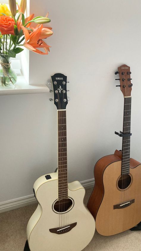 Autumnal flowers, white electric guitar, acoustic guitar wooden. Gitar Vintage, White Electric Guitar, Guitar Aesthetic, Guitar Obsession, Guitar Photos, Guitar Acoustic, Guitar Girl, Wooden Light, Flowers White