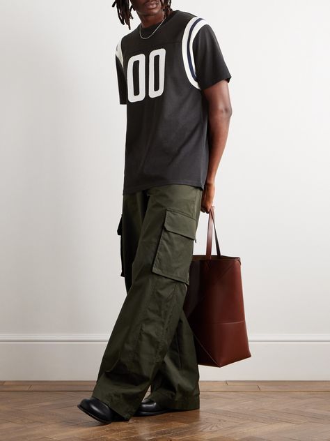 A '00' hasn't been sported on an NFL uniform since the '70s, but Loewe makes an exception with this T-shirt. Riffing on American football jerseys, it's made from cotton-blend jersey with an appliquéd front and embroidered 'Anagram' at the nape. Loewe Logo, Nfl Uniforms, American Football Jersey, Loungewear Shorts, Nfl Shirts, Luxury Sneakers, Latest T Shirt, Embroidered Tshirt, Derby Shoes