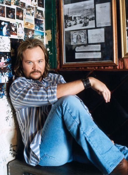 In 1992, Travis Tritt found his little slice of heaven - a cabin in the mountains of Georgia. That little cabin became an occasional retreat, a place to go to walk along the lake or maybe write a few songs. A couple years later, he'd bring his soon-to-be-wife, Theresa, to dream about the future. "I started taking her there, and we'd talk about kids, about what a great place this would be to bring them to," Tritt says from his main home, a 75-acre farm near Atlanta. Nine y... Marty Stewart, 90s Hits, Country Western Singers, Travis Tritt, Hot Country Songs, Forever My Girl, Cabin In The Mountains, Slice Of Heaven, Country Singer