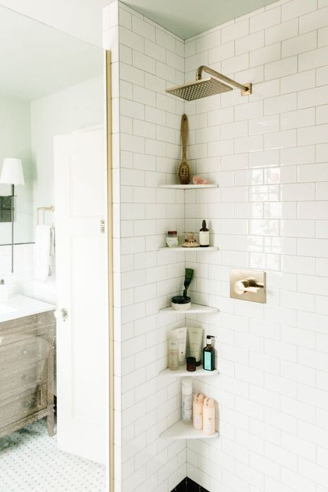 From open shelving to floating ledges, there are plenty of ways to keep your space in order. Trust us. Here are 12 shower storage ideas that will keep your Aesop addiction looking neat. #hunkerhome #shower #storage #showerstorage #bathroom #bathroomstorage Small Bathroom Shelves, Dekorere Bad, Diy Bathroom Storage Ideas, Decor Baie, Shower Storage, Diy Bathroom Storage, Small Showers, Small Bathroom Storage, Shower Shelves