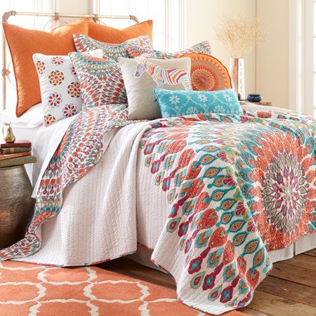 The Mirage Reversible Full/Queen Quilt Set by Levtex Home is inspired by a lively bazaar. Offered in shades of orange, teal, pink and green, this design will immediately transform your bedroom. Made with the softest lightweight cotton, this reversible quilt features a marge mandala that envelopes the bottom of your bed on one side, reversing to an overlapping medallion pattern on the other. The Full/Queen Quilt Set has a cotton-rich filler that is machine washable and includes the quilt (88x92in Bohemian Bedding Sets, Bedding And Curtain Sets, Medallion Bedding, Boho Bedding Sets, Teal Bedroom, Farmhouse Living Room Furniture, King Quilt Sets, The Mirage, Cute Bedding