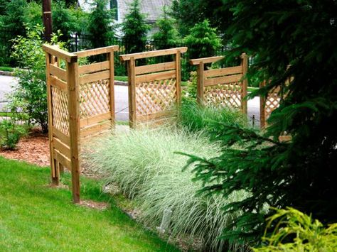 Instead of putting up an entire fence, build a privacy barrier with wood panels. Learn how on HGTV.com. Molde, Diy Patio Ideas, Diy Privacy Screen, Privacy Fence Panels, Patio Privacy Screen, Patio Pictures, Landscape Timbers, Patio Privacy, Privacy Fence Designs