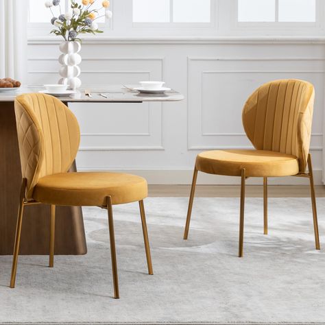 PRICES MAY VARY. Set of 2 dining chairs.The chair size is relatively small, please refer to Figure 2 to see if it is suitable for your home. Installation instructions and tools are included in the carton, so you can easily complete the installation in 10 minutes. The back and seat of the chair are upholstered in soft velvet with thick padding.Backrest radian 120 degrees, more fit the body waist line.The bottom is secure with rubber type for non-slip feature.Golden metal legs are more sturdy and Yellow Dining Chairs, Vanity Chairs, Yellow Chairs, Dining Chair Upholstered, Velvet Dining Chair, Chair Size, Midcentury Modern Dining Chairs, Yellow Chair, Vanity Chair