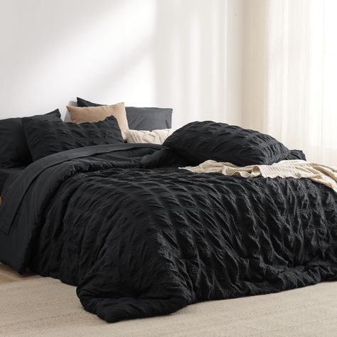 PRICES MAY VARY. Elegant Home Decor: This king size comforter set combines the exquisite seersucker craft with a plaid pattern, bringing a touch of sophisticated style to any sleeping space. Give the gift of elegant coziness to your loved ones, whether it’s for Mother’s Day, Women's Day, Christmas, or just to show you care. Cloud-like Warmth: Featuring Bedsure's thoroughly tested microfiber filling blend, this comforter maintains the perfect balance between weight and warmth, creating a cloud-li Seersucker Bedding, Black Comforter Sets, Full Size Comforter Sets, Queen Size Comforter Sets, Twin Size Comforter, King Size Comforter Sets, Full Comforter Sets, Black Comforter, Down Alternative Comforter