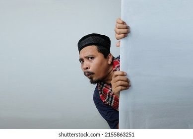 Curious Man Peeking Behind Wall Stock Photo 2155863251 | Shutterstock Peeking Behind Wall Pose, Person Peeking Around Corner, Peeking Drawing, Curious Pose Reference, Portait Pose, Corner Drawing, Poem Illustration, Pose Refrences, Curious People