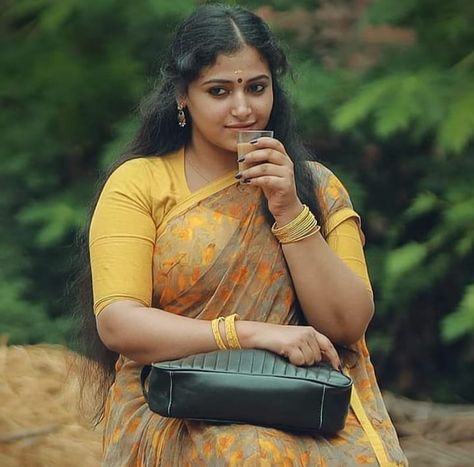 Anu Sithara offical shared a photo on Instagram: “😍🧡” • See 2,672 photos and videos on their profile. Curvy Girl Fashion, Anu Sitara, Anu Sithara, Grace Beauty, Saree Photoshoot, Beautiful Dresses Short, Actress Pics, Cute Beauty