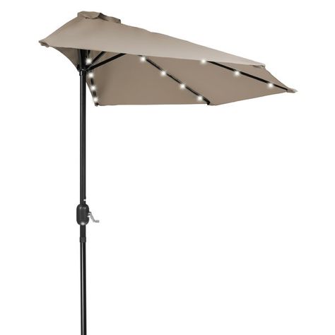 This unique, compact half umbrella contains 5 steel ribs with each rib having 4 solar powered LED lights. The canvas is 180G polyester so will stand up to the elements. Easy crank operation. Perfect for small spaces that can't fit a full umbrella, the half umbrella stands flush against a wall or glass door. Umbrella base not included. Half Umbrella, Patio Umbrella Stand, Black Steel Frame, Umbrella Stands, Market Umbrella, Outdoor Umbrella, Patio Umbrellas, Home Comforts, Umbrella Stand