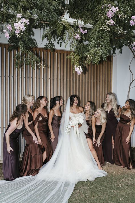bridesmaids in mix and match brown gowns for an earthy and romantic boho beach wedding in Ibiza Mismatch Brown Bridesmaid Dresses, Mixed Matched Bridesmaids Neutral, Natural Colour Bridesmaid Dresses, Brown Bridesmaid Dresses And Groomsmen, Brown And Black Bridesmaid Dresses, Coffee Brown Bridesmaid Dress, Bridesmaid Dresses Natural Colors, Brown Colored Wedding, Brown Bridesmaids And Groomsmen