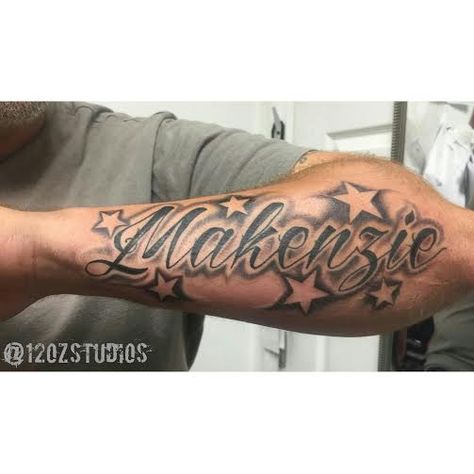 Awesome cursive script style lettering with negative stars male forearm tattoo by Jose Bolorin. Tattoo With Stars Men, Male Name Tattoo Ideas, Name With Stars Tattoo, Cursive Forearm Tattoo Men, Cursive Tattoos Men, Last Name Forearm Tattoo Men, Mom Name Tattoo For Men Forearm, Name Forearm Tattoo Men, Tattoo Ideas For Men Name