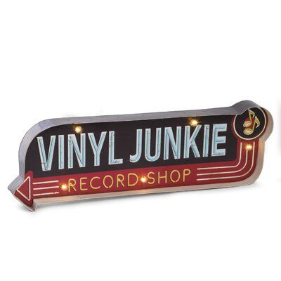 Do you love classic rock and roll and old style of vinyl records? The vintage-inspired sign says it all, "Vinyl Junkie, Record Shop." This attention-grabbing LED Marquee Sign is an excellent addition to your space, sure to add whimsy and nostalgia. Featuring a metal and weathered look, the lights are designed to mimic the look of a classic marquee. Since these lights are battery operated, there is no need to hide unsightly cords. | Williston Forge LED Marquee Sign, Metal in Black, Size 7.0 H x 2 Vinyl Record Room Decor, Record Room Decor, Movie Poster Marquee, Rock N Roll Bedroom, Kate Spade Baby Shower, Record Room, Music Studio Room, Classic Rock And Roll, Marquee Lights