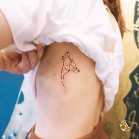 what is the meaning of a wolf tattoo? – neartattoos Wolf Tattoo For Women Minimalist, Mini Wolf Tattoo For Women, She Wolf Tattoo Minimalist, Outline Wolf Tattoo, Wolf Tattoo Ideas For Women Small, Delicate Wolf Tattoo, Spiritual Wolf Tattoo, Minimalistic Wolf Tattoo, Wolf Tattoo Linework