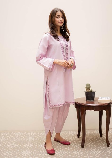 Includes: Shirt Shalwar Fabric: Silk Work Technique: Embroidery & Embellishment Description: This ensemble was designed on the illuminating lavender hue crafted with monochrome palette. Beautifully embellishmed with embroidered neckline of tilla, silk threads and sequence detail paired with tulip shalwar. This breezy Lavender pallete gives a perfect summer vibe !!! A must have for your summer look. Disclaimer: The color of the outfit may vary due to the lighting effect used in the photography. Shirt Shalwar Designs Women, White Desi Outfit, Lavender Pallete, Tulip Shalwar Design, Shalwar Kameez Designs For Women, Tulip Shalwar, Shalwar Design, Shalwar Kameez Designs, Dress Designing