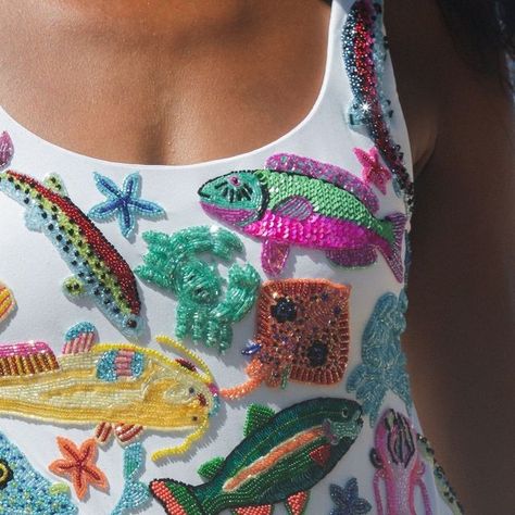 Oceanus on Instagram: "Swipe to see the story behind the new ARIZONA Swimsuit. Our Founder Hannah parked up by this Bali street food vendor and was mesmerised by the colours of the fish. ⁠
⁠
This swimsuit is an art piece, embroidered with crystals by our highly skilled artisans.⁠
⁠
Tap to shop this key piece of our SS24 collection.⁠
⁠
#oceanus #fashion #swimwear⁠" Patchwork, Swimwear With Beads, How To Embroider Beads, Beading Clothes, Embroided Clothes, Beaded Swimsuit, Beaded Swimwear, Fish Clothes, Embroidered Swimsuit