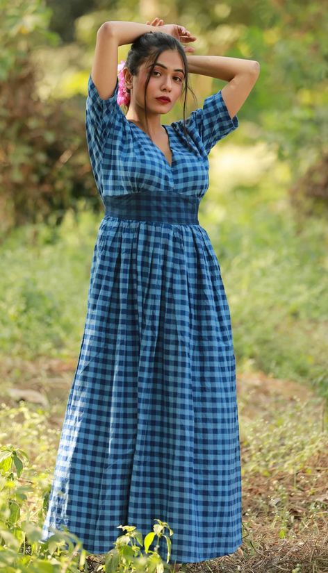 There are checks on the long frock suit design. Each of the four dresses has a unique colour and sleeve and neck pattern. Cotton Long Frocks For Women, Cotton Long Frocks, Long Frock Suit, Frock Suit Design, Long Frocks For Women, Frocks For Women, Frock Suit, Long Frock Designs, Long Frock