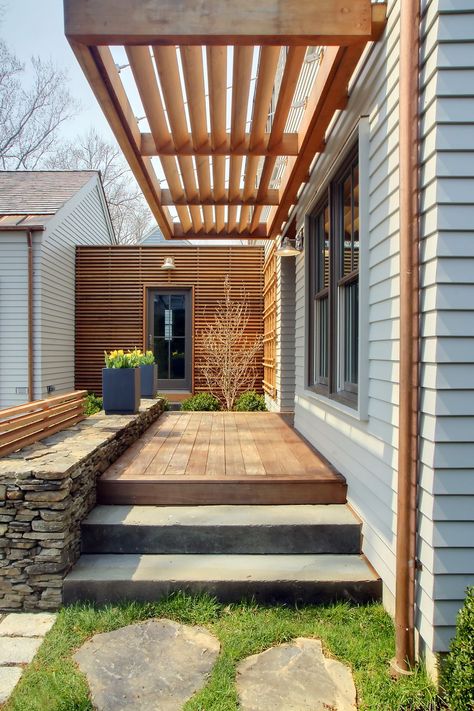 Paneling, wood, and stone, unite for a texturally diverse—and dynamic—modern home exterior, #greenwich #greenwichhomes #modernhomes #modernarchitecture #homeexteriors Mosquito Curtains, Modern Pergola, Pergola Design, Pergola Attached To House, Wooden Pergola, Backyard Pergola, Deck With Pergola, Pergola With Roof, Covered Pergola