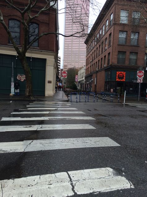 This photo describes the term alignment. While viewing this photo your eye is caught by the stripes of the crosswalk. Your eye follows them to the sidewalk. Showing  alignment that once you cross the crosswalk you get to the sidewalk downtown. The crosswalk is aligned with the sidewalk, showing that they belong together. That you have to cross the crosswalk before you can get to the other side on the side walk. Cross Walk Photography, City Crosswalk, Belong Together, Sidewalk Background, Street Sidewalk, Road Drawing, City Sidewalk, Kings College, Background References