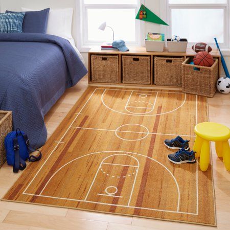 Mohawk's Basketball area rug is the height of contemporary decor for your child's bedroom. Fitting for a basketball fanatic, this is a detailed depiction of a basketball court in a pleasing tan shade. Made of EverStrand polyester, this rug is eco-friendly. Size: 3'4"x5'.  Color: Brown.  Pattern: printed. Construction Theme Basket, Basketball Room Decor, Sports Bedroom, Basketball Bedroom, Basketball Room, Sport Bedroom, Kids Area Rugs, Sports Room, Big Boy Room