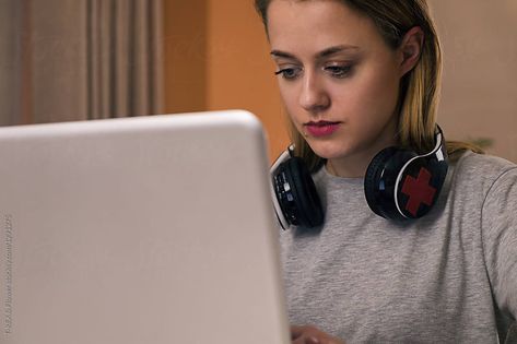 Female with headphones around neck browsing laptop by T-REX & Flower for Stocksy United Headphone Reference Around Neck, Headphones On Neck Reference, Headphones On Neck, Headphones Around Neck, Soldier Female, Neck Drawing, Wearing Headphone, Cool Tech Gadgets Electronics, Girl With Headphones