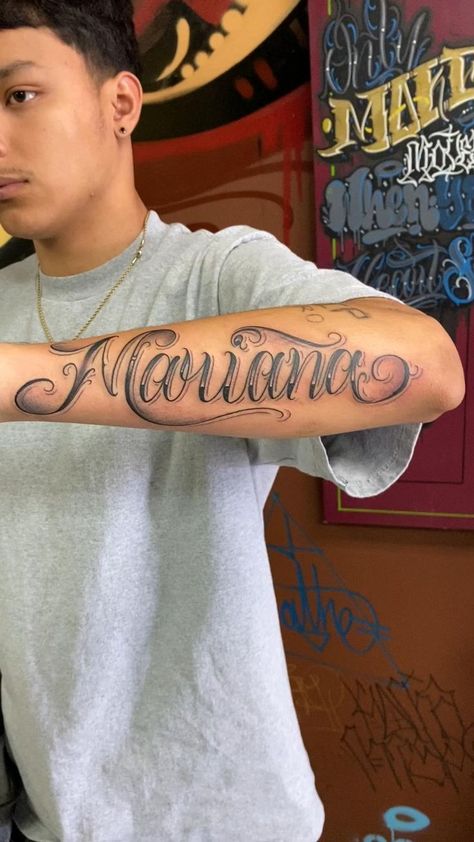 Custom Forearm Name Tattoo [Video] | Forearm name tattoos, Cursive tattoos, Tattoos in 2022 | Forearm name tattoos, Cursive tattoos, Tattoo lettering Cursive Writing Tattoos Forearm, Forearm Cursive Tattoo, Big Name Tattoos, Forearm Name Tattoo, Mariana Tattoo, Last Name Tattoos For Men, Cursive Name Tattoo, Last Name Tattoos, Forearm Name Tattoos