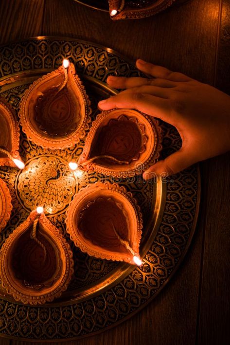 Happy diwali - Hand holding or lighting or arranging diwali diya or clay lamp in , #spon, #holding, #lighting, #arranging, #Happy, #diwali #ad Diya Photos For Diwali, Happy Diwali Asthetic Picture, Diwali Pataka Image, Diwali Diya Aesthetic, Diwali Asethic, Diwali Diya Photography, Happy Diwali Aesthetic, Diwali Asthetic Picture, Diwali Aesthetic Photography