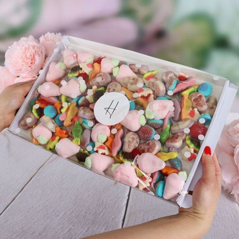 Send sweet gifts without hassle with our Letterbox Gifts service. The Jelly Filled Pick N Mix Sweets Box contains delicious sweet treats from Jelly Filled Snails to Jelly Filled Strawberry Marshmallows! This delicious pick n mix box is perfect for any and every occasion and makes the perfect gift for someone you love. Our Letterbox Gifts are presented in a recyclable cardboard box. Perfect to send directly to your recipient for the ultimate convenience. The Standard Jelly Filled Pick N Mix Sweets Letterbox Gift Hamper Contains: Jelly Filled Snails, Jelly Filled Turtles, Jelly Filled Strawberries, Jelly Filled Strawberry Marshmallows, Jelly Filled Brains, Jelly Filled Skulls - 500g The Extra Large Jelly Filled Pick N Mix Sweets Letterbox Gift Hamper Contains: Jelly Filled Snails, Jelly Fill Filled Strawberry, Filled Strawberries, Congrats Gifts, Unique Gift Cards, Strawberry Filling, Gift Hamper, Pick And Mix, Letterbox Gifts, Chocolate Treats