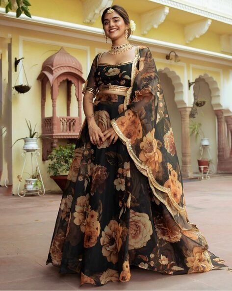 Buy Black Lehenga Choli Sets for Women by ZEEL CLOTHING Online | Ajio.com Lengha Sari, Golden Lehenga, Black Lehenga Choli, Lehenga Choli For Women, Choli For Women, Printed Organza, Organza Lehenga, Black Lehenga, Floral Lehenga