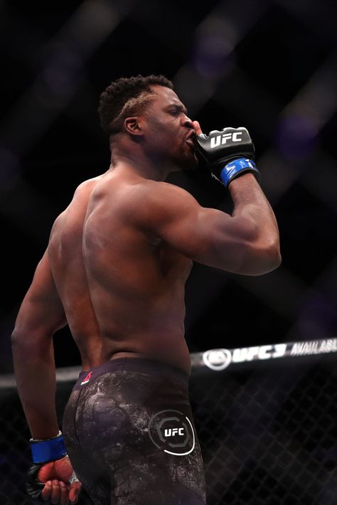 BEIJING, CHINA - NOVEMBER 24: Francis Ngannou of Cameroon celebrates after his TKO victory over Curtis Blaydes in their heavyweight bout during the UFC Fight Night event at Cadillac Arena on November 24, 2018 in Beijing, China. (Photo by Emmanuel Wong/Getty Images) Donald Cerrone, Francis Ngannou, Mens Haircuts Short Hair, Ufc Fighter, Ufc Fighters, Tyson Fury, Mma Boxing, Better Posture, Martial Artists