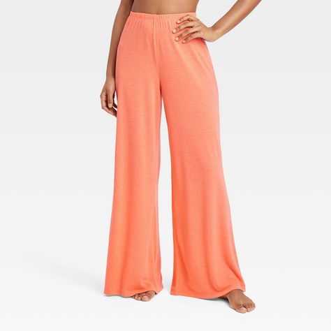 Add supreme comfort to your sleepwear with this Slub Knit Pants from Stars Above™. These mid-rise slub knit pants fashioned in a breezy wide-leg silhouette bring relaxed style to your look. The full elastic waistband lends a secure fit and allows for pull-on easy wear. Plus, faux pockets add to the chic flair. Pair with a variety of tees, tanks tops and sweatshirt for a number of comfy sleep ensembles. Stars Above™: A restful balance of comfort & style. Comfy Outfits For School, Romcom Core, Tropical Glow, Knit Wide Leg Pants, Target Pants, Trousers Women Wide Leg, Tapered Joggers, Comfy Sets, Tanks Tops